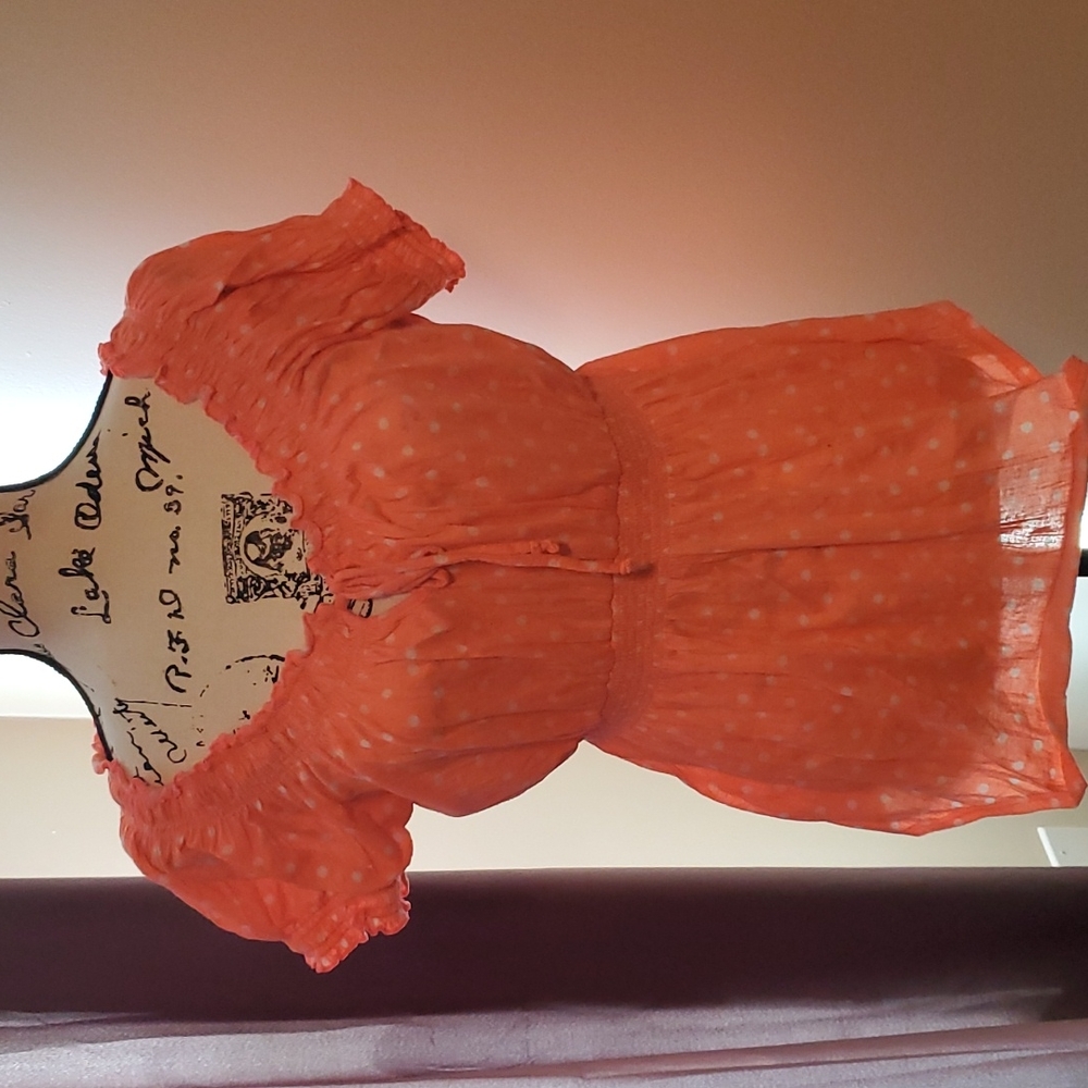 Orange with white polka dot top